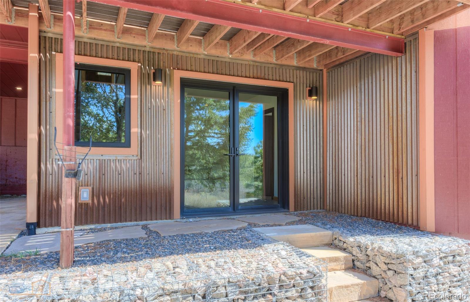 548 Coughlin Meadows Road Boulder, CO 80302 - Photo 11 of 50 a front view of a house