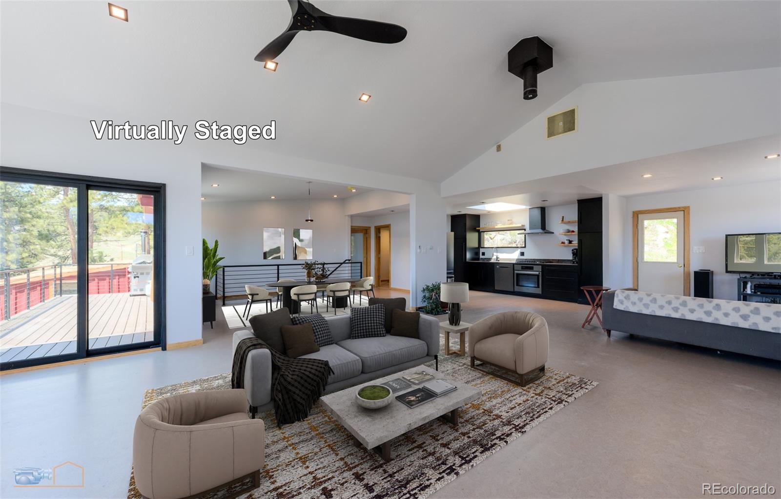 548 Coughlin Meadows Road Boulder, CO 80302 - Photo 27 of 50 a living room with furniture and a large window