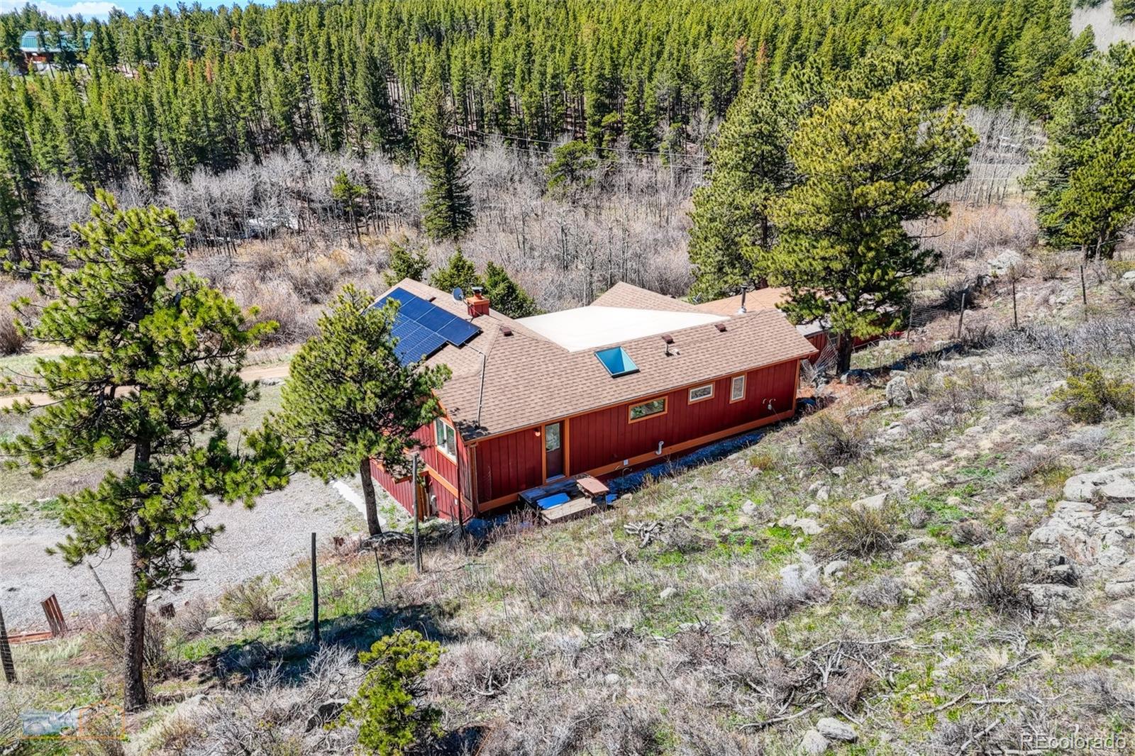 548 Coughlin Meadows Road Boulder, CO 80302 - Photo 33 of 49 an aerial view of a house with a yard