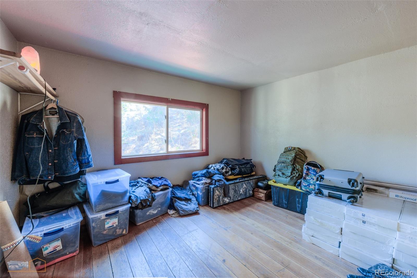 548 Coughlin Meadows Road Boulder, CO 80302 - Photo 45 of 50 a living room with furniture and a window