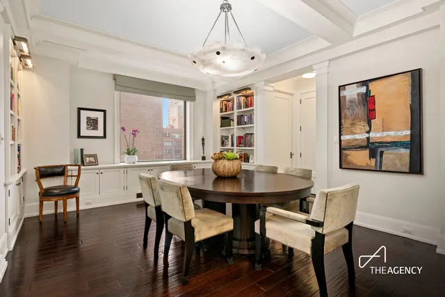 a kitchen with a sink stove top oven and cabinets