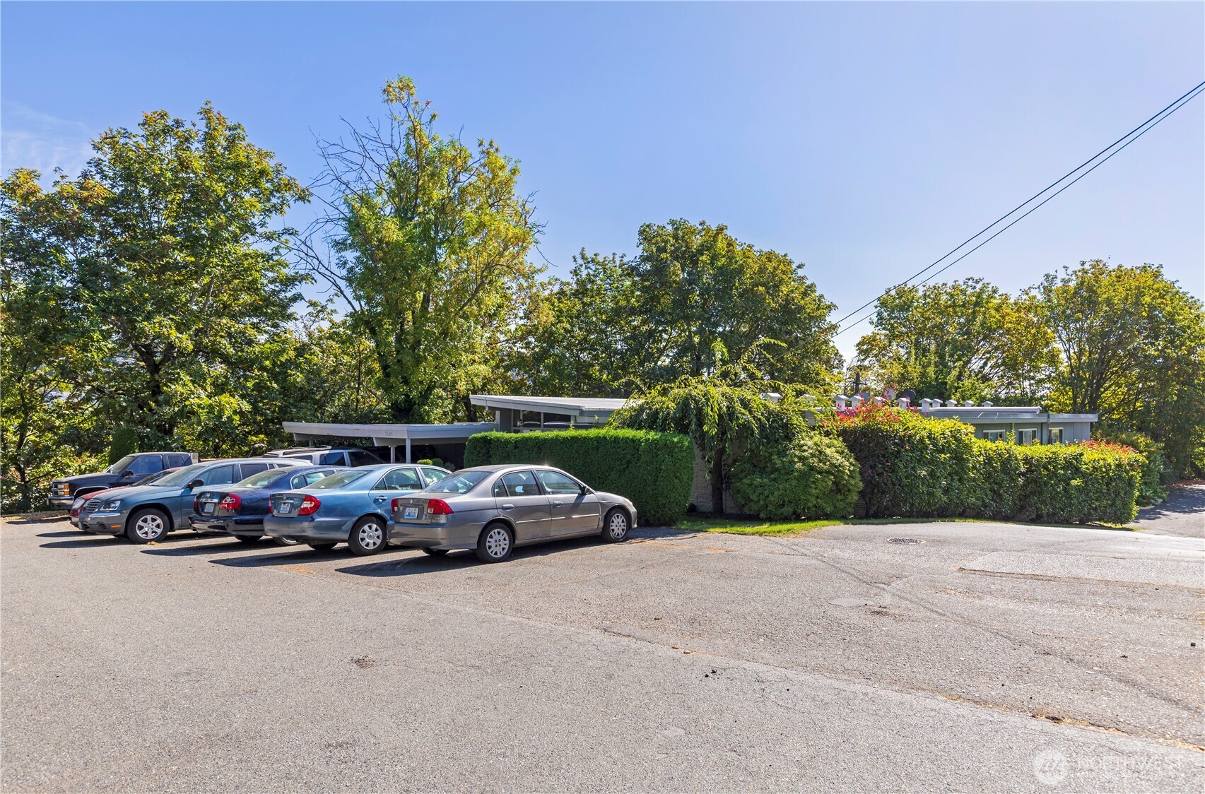 2109 West Raye Street Seattle, WA 98199 - Photo 2 of 9 a car parked on the side of the road