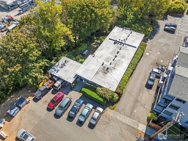an aerial view of a house with outdoor space