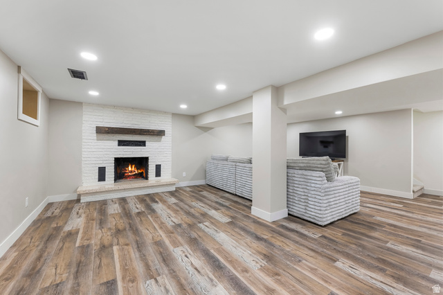 523 South Main Street Payson, UT 84651 - Photo 27 of 41 Spacious living area featuring wood-finish flooring and recessed lighting