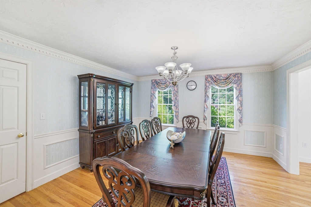 85 Cedarwood Road Boxborough, MA 01719 - Photo 11 of 41 a view of a dining room with furniture window and wooden floor