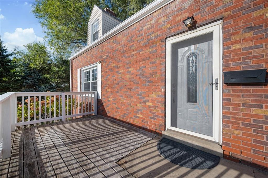 991 Forsythe Road Carnegie, PA 15106 - Photo 2 of 49 a view of a brick house with a large window