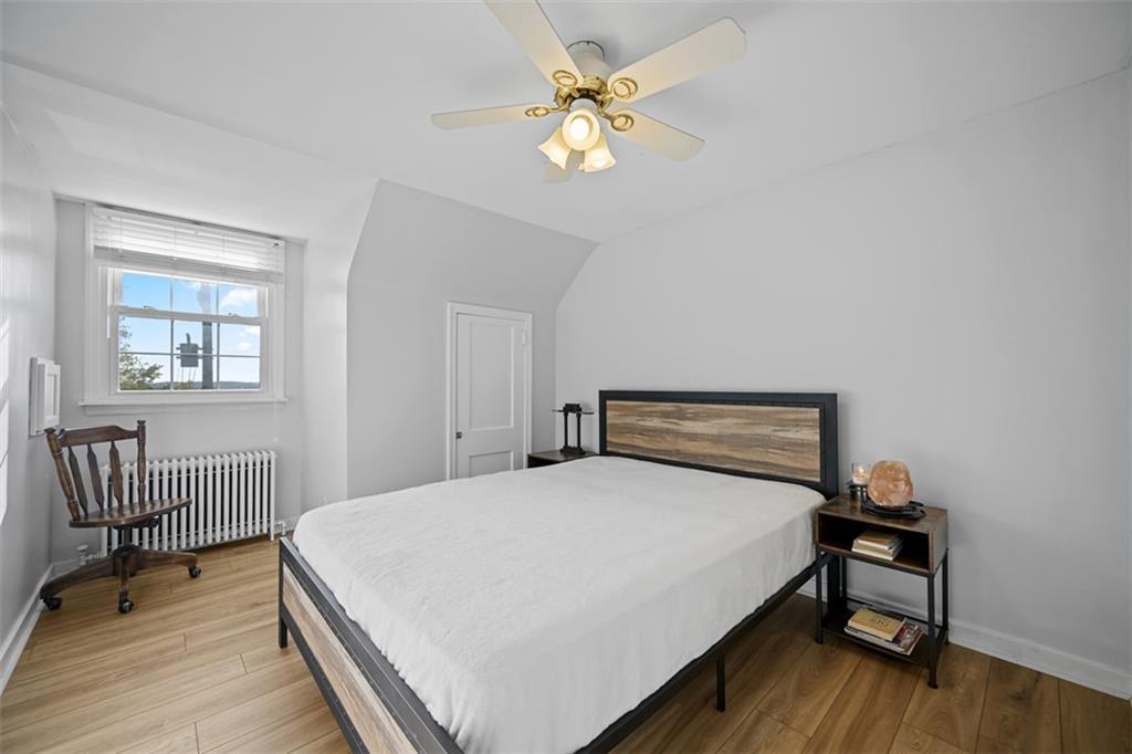 991 Forsythe Road Carnegie, PA 15106 - Photo 26 of 49 a bedroom with a bed a table and chair