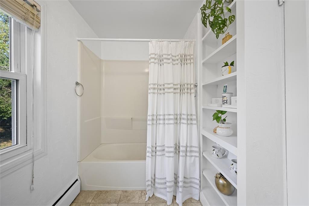 991 Forsythe Road Carnegie, PA 15106 - Photo 29 of 49 a bathroom with a bathtub and shower