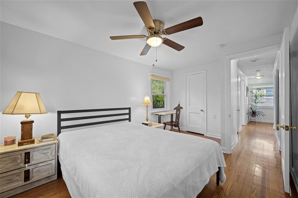 991 Forsythe Road Carnegie, PA 15106 - Photo 32 of 49 a bedroom with a bed and a chandelier