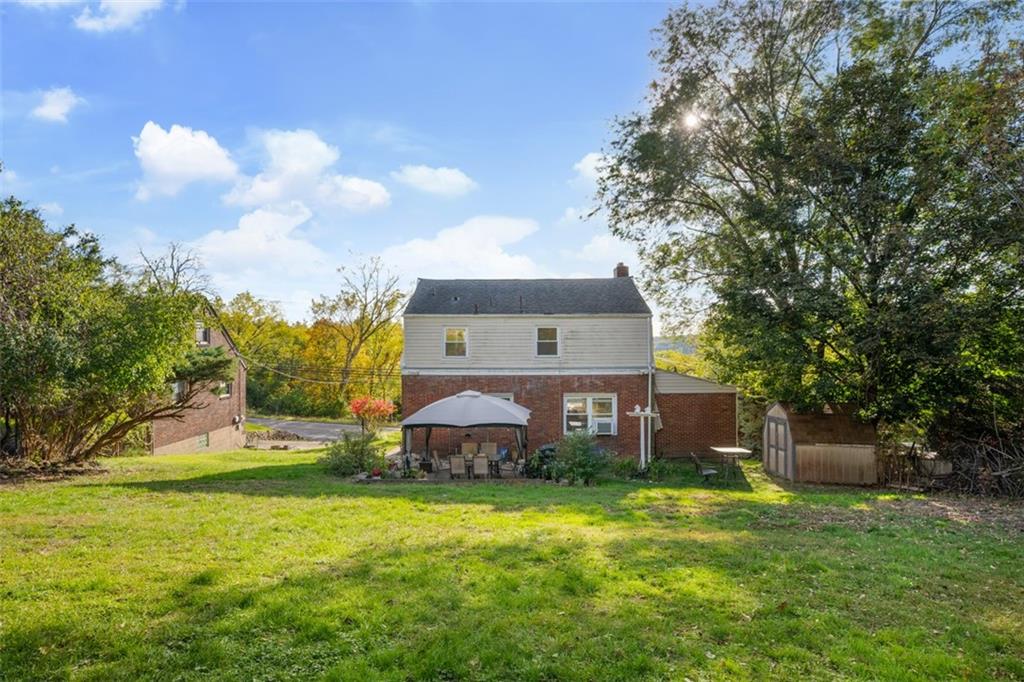 991 Forsythe Road Carnegie, PA 15106 - Photo 43 of 49 a front view of a house with garden