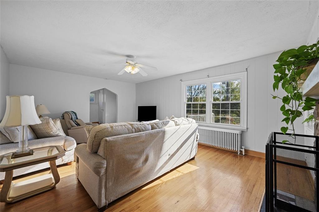 991 Forsythe Road Carnegie, PA 15106 - Photo 5 of 49 a bed room with a bed and a chair