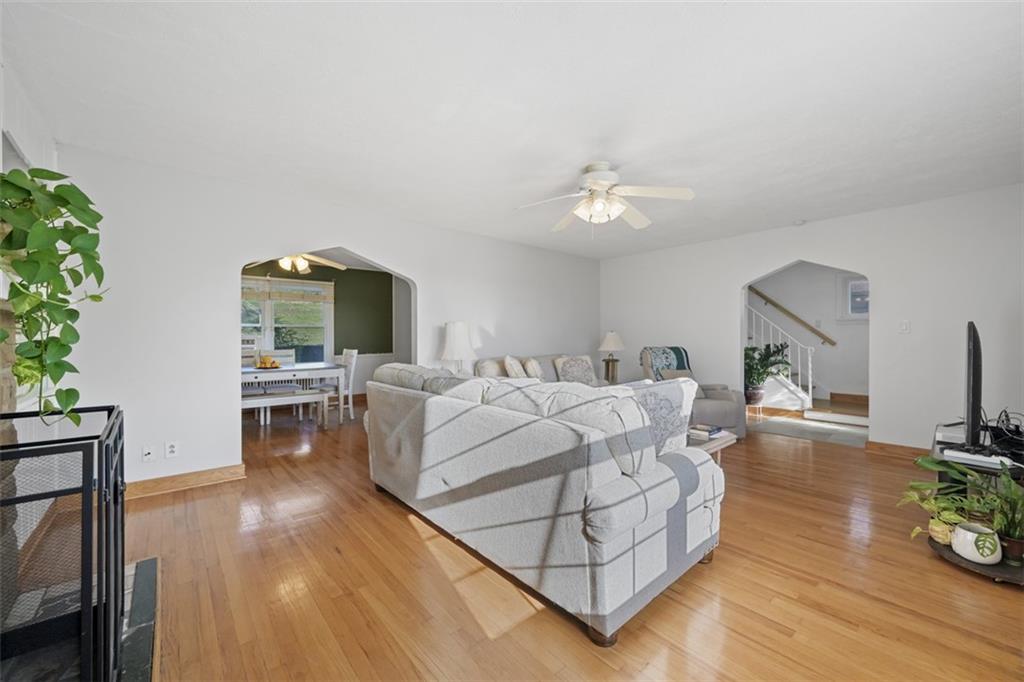 991 Forsythe Road Carnegie, PA 15106 - Photo 8 of 49 a living room with furniture and a wooden floor