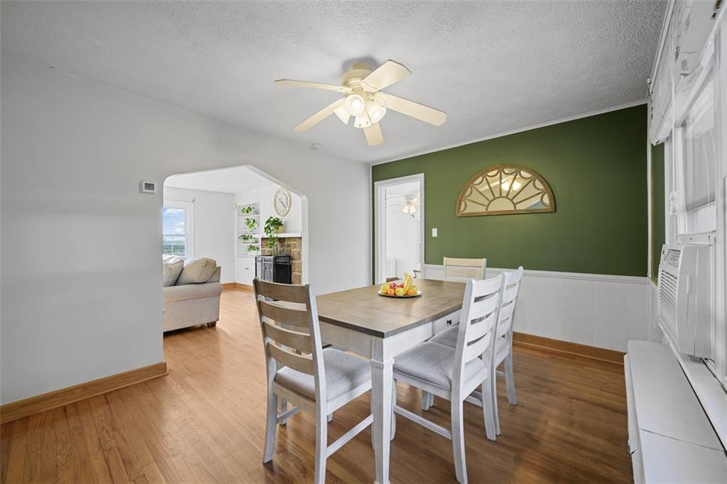 991 Forsythe Road Carnegie, PA 15106 - Photo 10 of 49 a view of a dining room with furniture wooden floor and chandelier