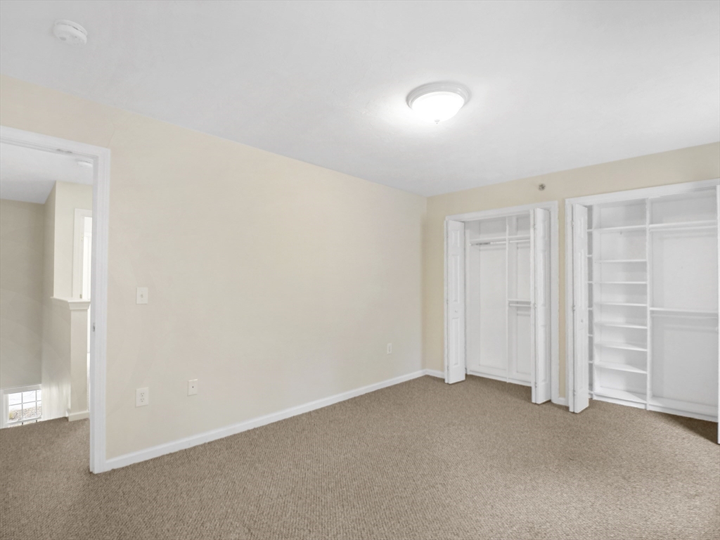 350 Riverbend Street, Unit 108 Athol, MA 01331 - Photo 14 of 27 an empty room with closet area
