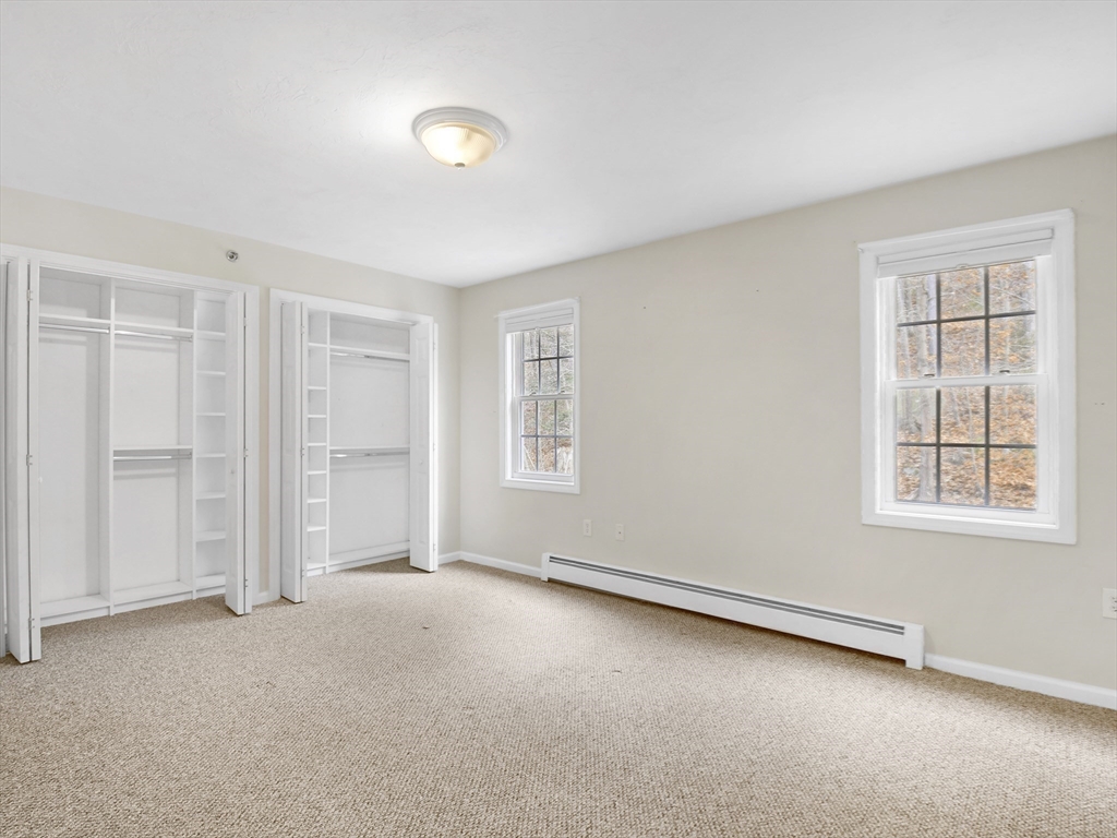 350 Riverbend Street, Unit 108 Athol, MA 01331 - Photo 15 of 27 an empty room with windows