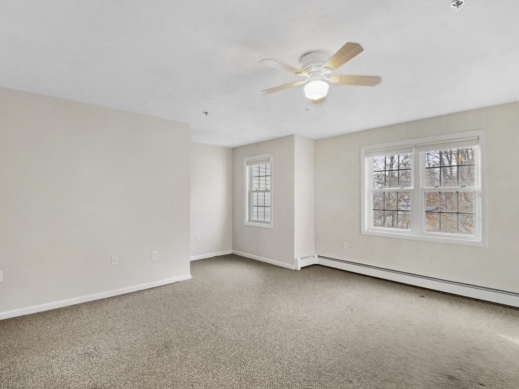 350 Riverbend Street, Unit 108 Athol, MA 01331 - Photo 10 of 27 a view of an empty room with a window