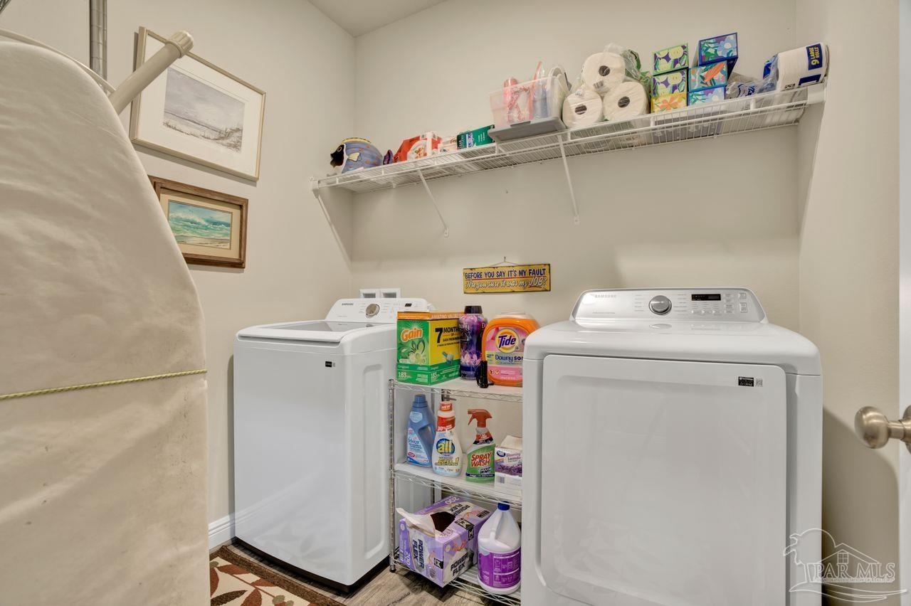 5364 Red Shoulder Road Pace, FL 32571 - Photo 19 of 46 a utility room with dryer and washer