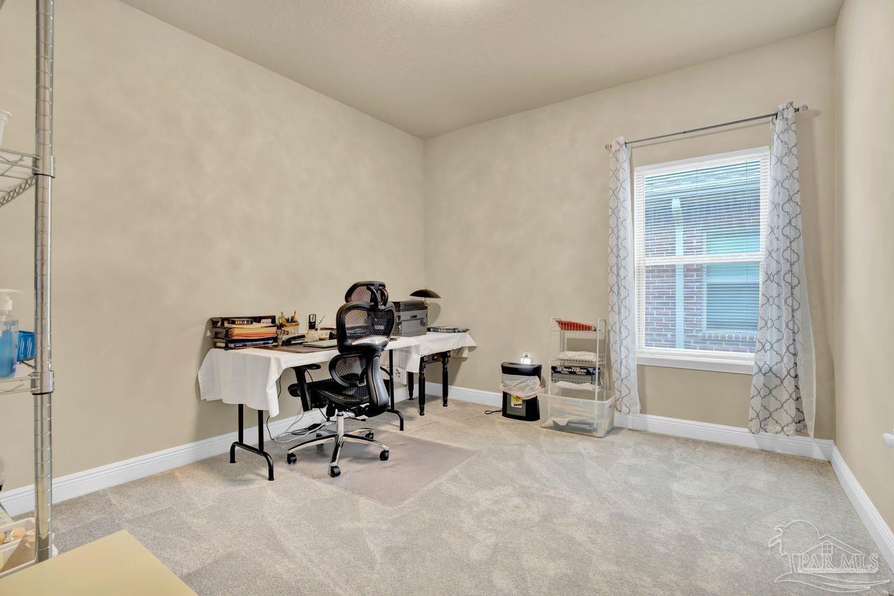 5364 Red Shoulder Road Pace, FL 32571 - Photo 20 of 46 a view of a workspace with furniture