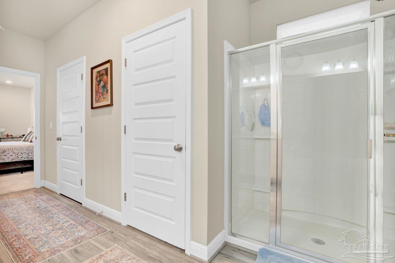 5364 Red Shoulder Road Pace, FL 32571 - Photo 39 of 46 a view of a bathroom with a shower