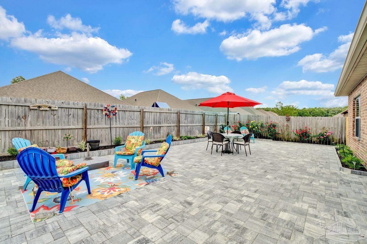5364 Red Shoulder Road Pace, FL 32571 - Photo 44 of 46 a view of house with outdoor seating space