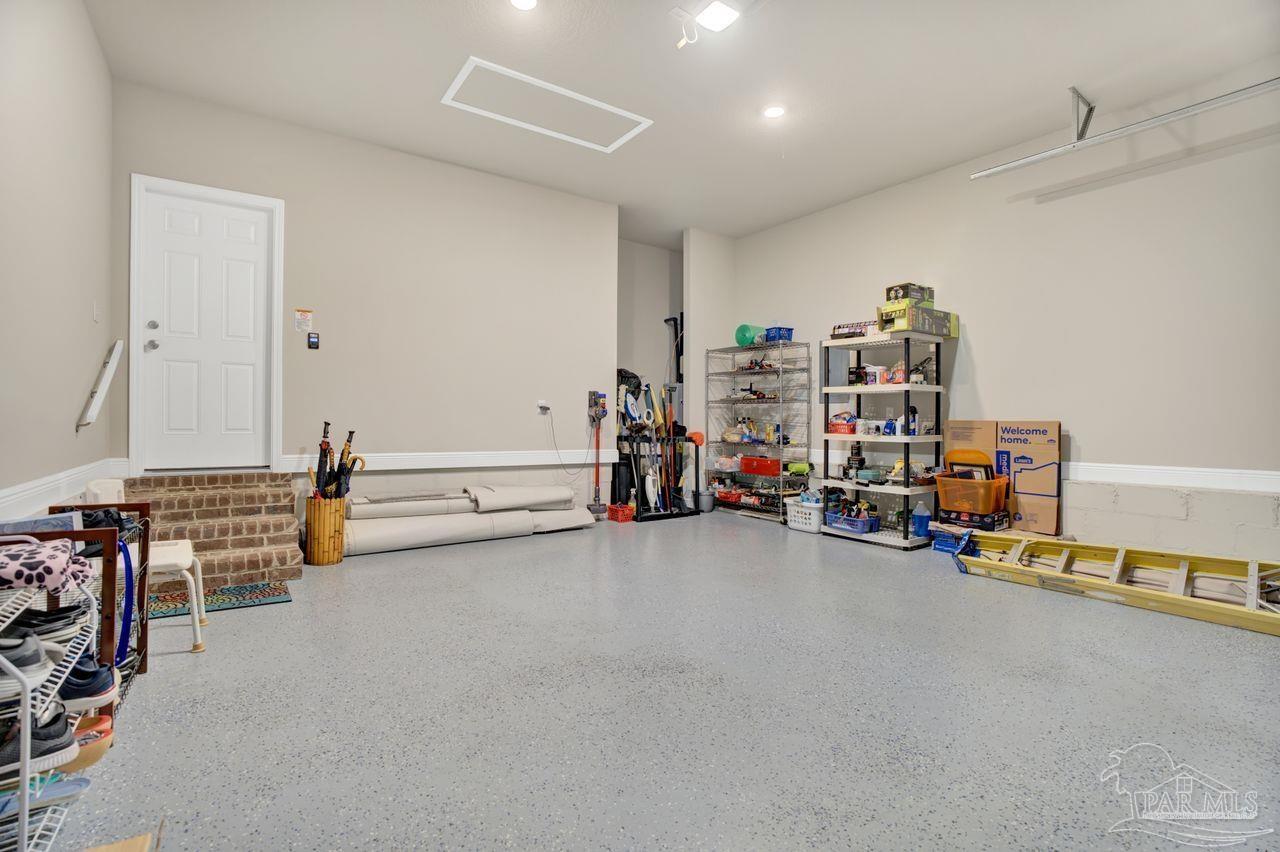 5364 Red Shoulder Road Pace, FL 32571 - Photo 8 of 46 a view of a room with gym equipment