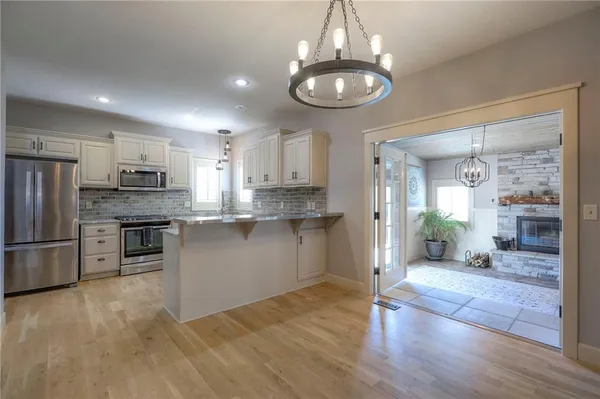 $550,000 | 1305 Ashdown Circle, Raymore, MO 64083