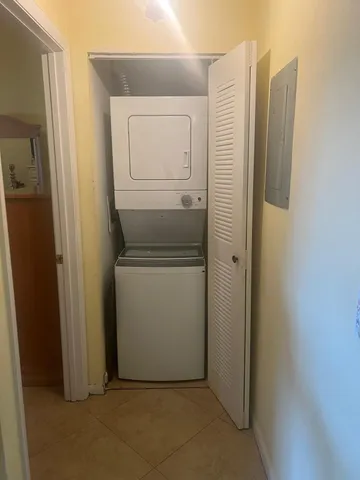 a utility room with washer and dryer