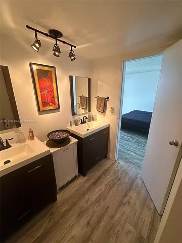 a view of a kitchen with a sink