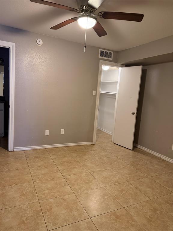 9805 Walnut Street, Unit C102 Dallas, TX 75243 - Photo 5 of 15 a view of an empty room