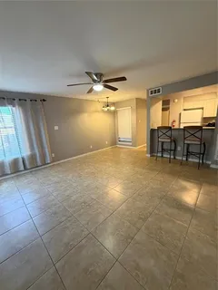 a view of a livingroom with furniture