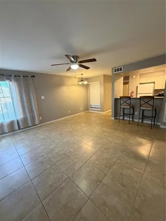 a view of a livingroom with furniture