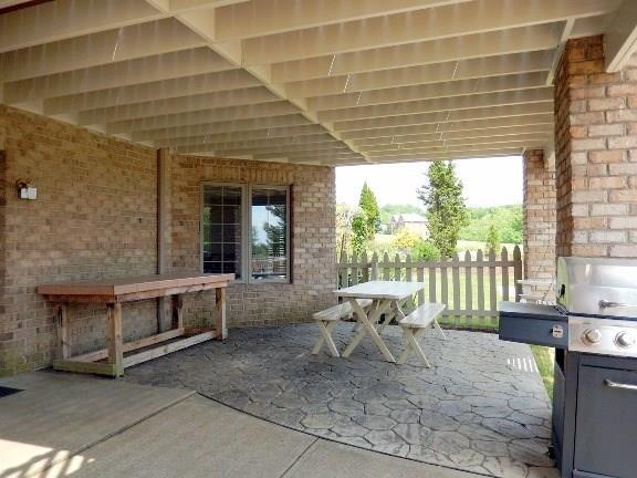 260 High Acres Road Harmony, PA 16037 - Photo 14 of 25 The large rear deck shelters you from the weather with this patio and grille area.