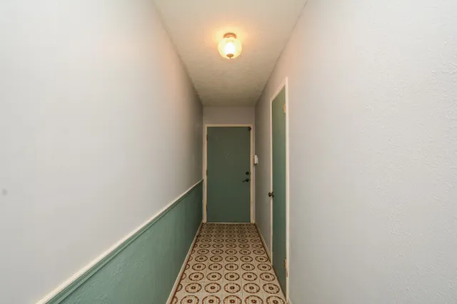 a view of hallway with stairs