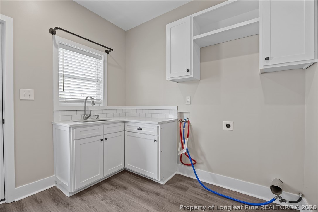 432 Pearidge Road Willow Spring, NC 27592 - Photo 12 of 47 a room with cabinets and window
