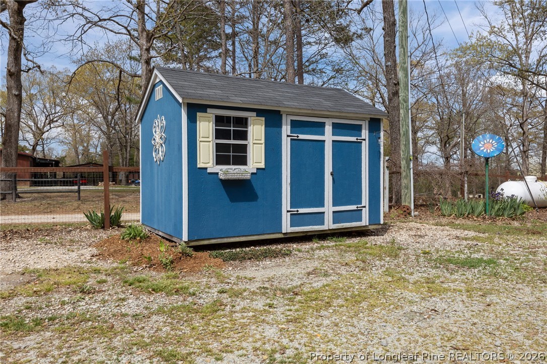 432 Pearidge Road Willow Spring, NC 27592 - Photo 31 of 47 a view of a house with a yard