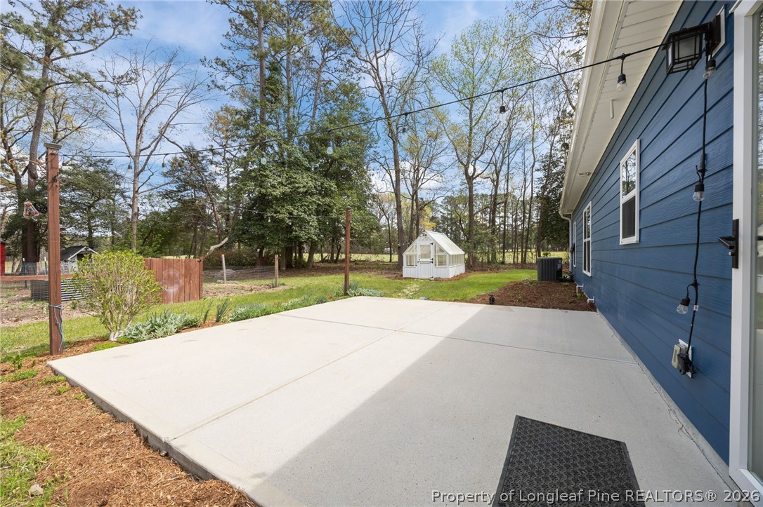 432 Pearidge Road Willow Spring, NC 27592 - Photo 32 of 47 a view of a yard with entertaining space