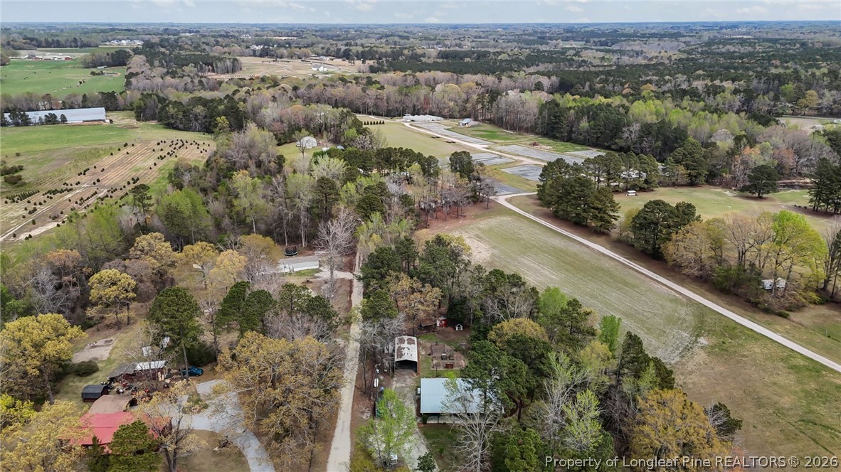 432 Pearidge Road Willow Spring, NC 27592 - Photo 43 of 47 an aerial view of residential houses with outdoor space