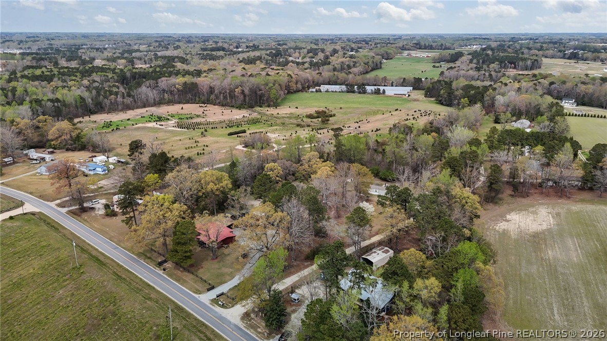 432 Pearidge Road Willow Spring, NC 27592 - Photo 44 of 47 a view of a city from a terrace