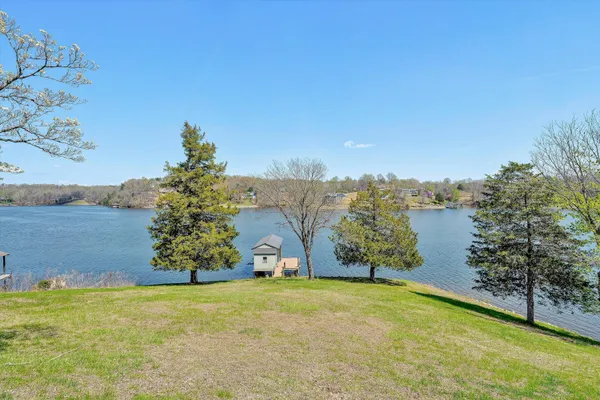 a view of a lake with a garden