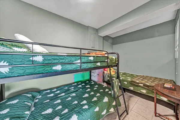 a kitchen with appliances cabinets and a window