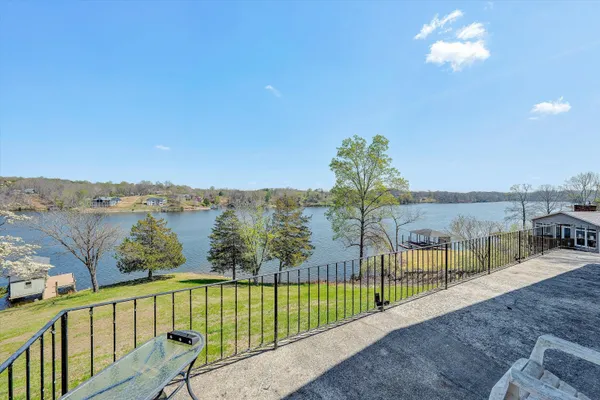 a large bed in a white room