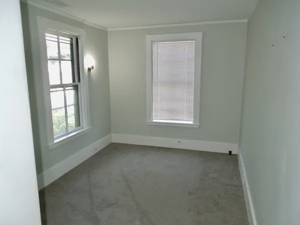 an empty room with windows