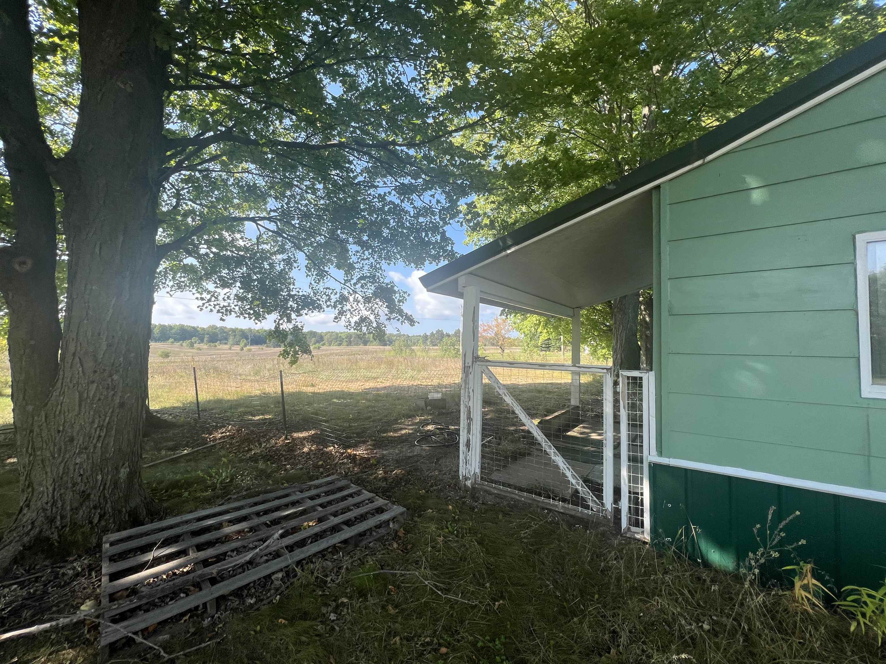 1537 North Lamb Road Interlochen, MI 49643 - Photo 1 of 27 Large Fenced in area