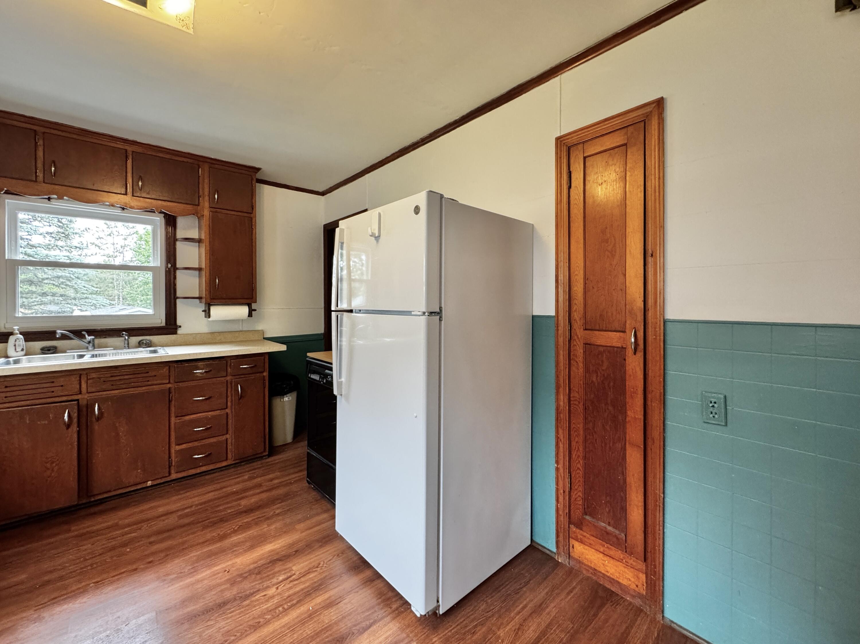 536 West Racine Street Jefferson, WI 53549 - Photo 7 of 18 Kitchen with Ironing Board Cabinet