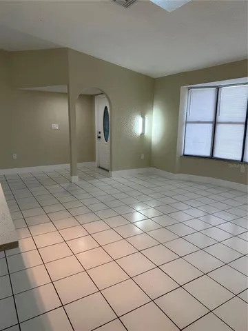 a view of a livingroom and a window