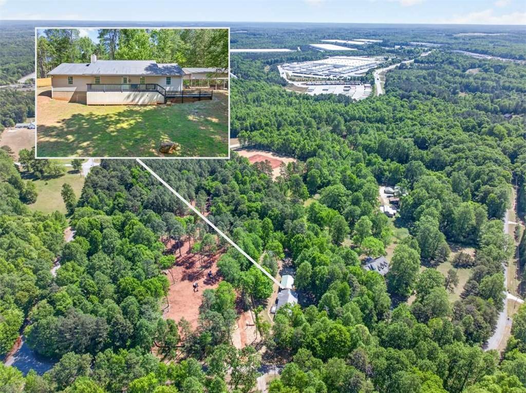 386 Ridgewood Drive Pendergrass, GA 30567 - Photo 3 of 50 an aerial view of residential house with outdoor space and trees all around
