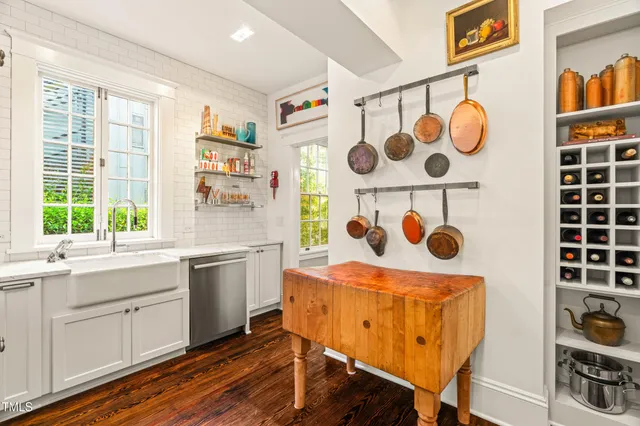 a kitchen with a cabinets and window