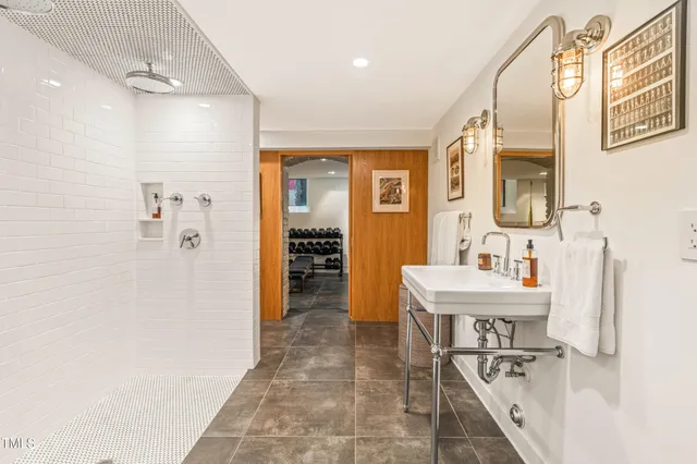 a bedroom with a bed and a table in it