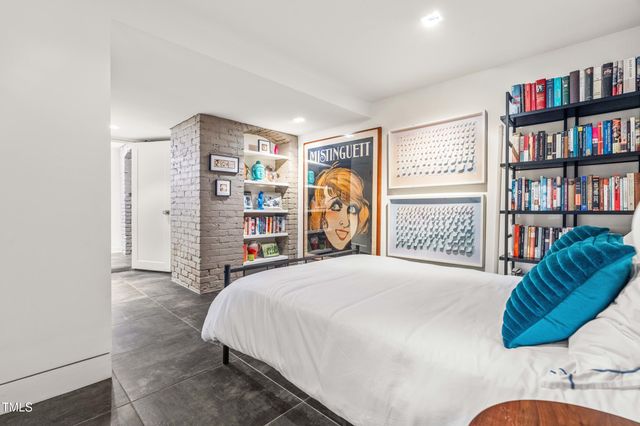 an aerial view of house with yard