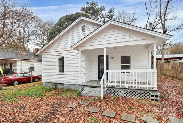 a front view of a house with a garage